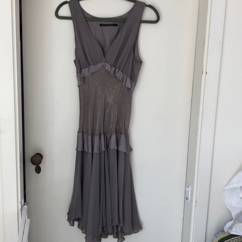Development grey dress with gold thread accent